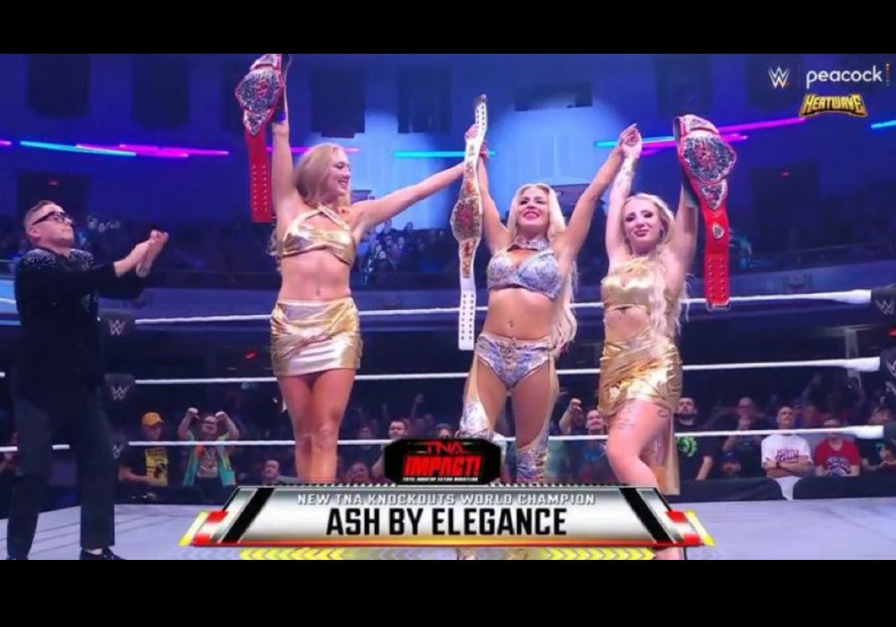1- WWE NXT Heatwave Worn Autographed Gold Outfit